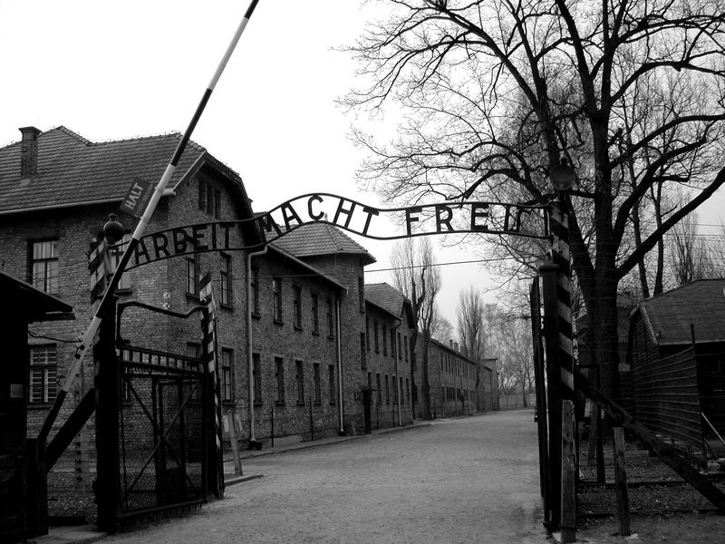 The entrance gate to Auschwitz I in black and white